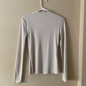 Beige turtleneck